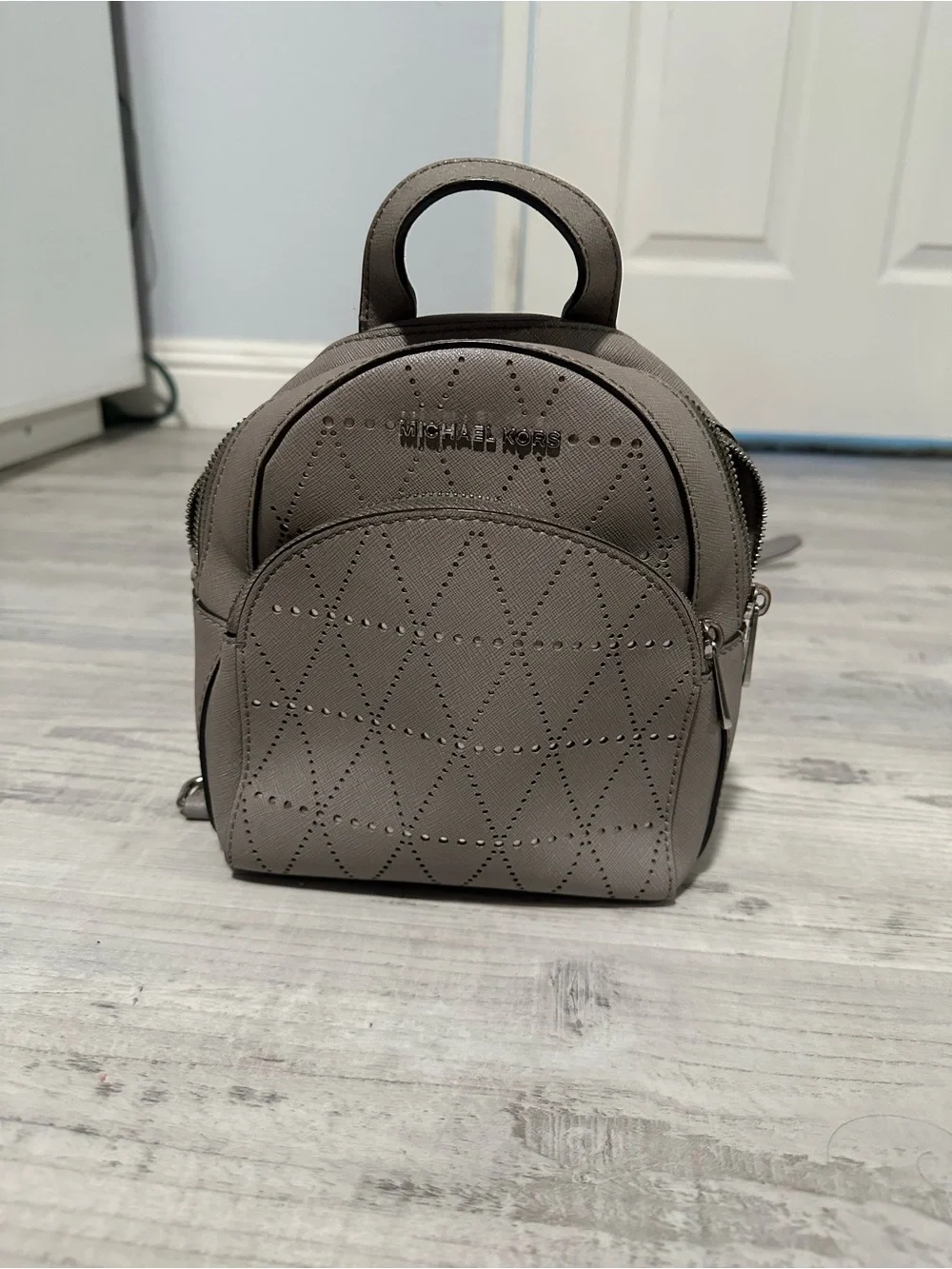 Michael Kors Taupe Perforated Mini Backpack